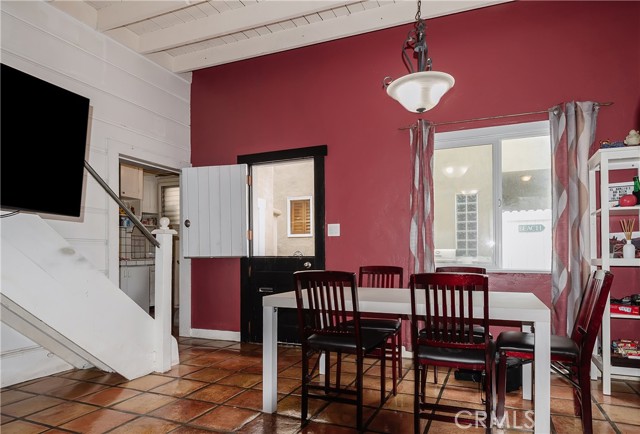 Rear Unit Dining Area With Split-Dutch Door To Patio