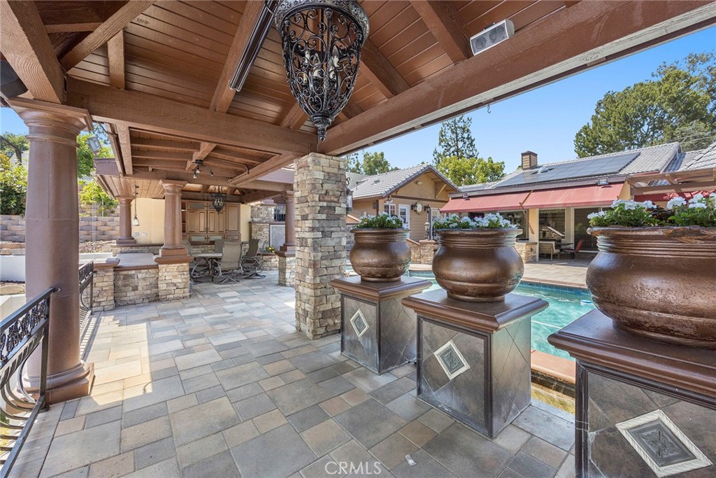 3 large Loggia’s will accommodate large patio seatings. Decorative flowered pots allow have water spouts cascading into the pool.