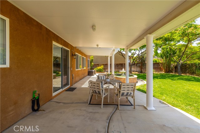 Patio with cover and seating area.