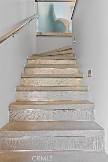 polished concrete treads with decorative custom steel risers