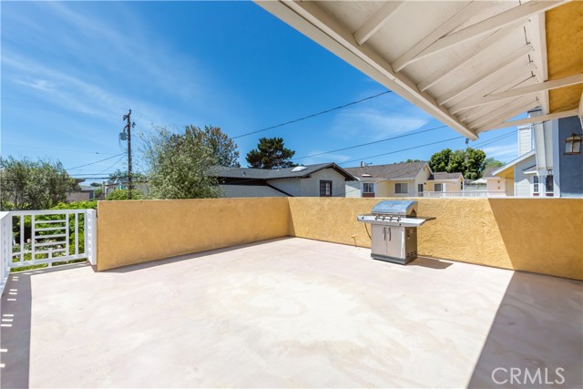 Deck off Family Room with stairs to back yard