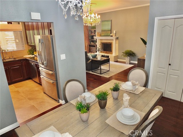 A view from the dining room into the kitchen & living room