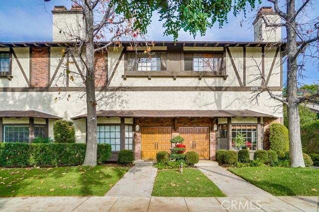 402 El Centro Street 11 South Pasadena, California Located across street from Arroyo Vista Elementary in South Pasadena. This spacious, split-level townhome has two bedroom and a den with a full bathroom. The den is advertised as the third bedroom. The unit has wood double doors open to soaring cathedral ceilings, a rustic rock fireplace, and built-in shelving in the foyer. The mezzanine level boasts a large kitchen equipped with ample storage and new stove and dishwasher. Upper level features a generous master suite with attached bath, and an additional bedroom and full bath. Thoughtfully designed to maximize comfort, this unit features large closets, security system.