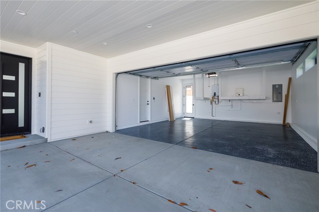 Direct access garage with finished floors