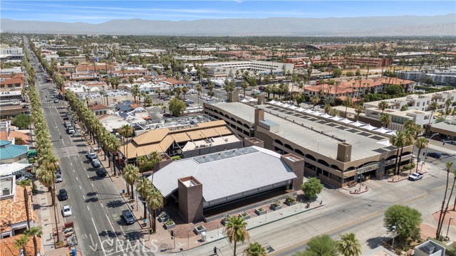 We are proud to present The Bank, located at 296 S. Palm Canyon Drive and encompassing 16,200± square feet of beautifully appointed single-tenant retail in a 2-story building and currently 100% occupied by Four Twenty The Bank. Attractive Seller financing offered of 75% LTV & 5.0% interest only.

The property is situated on 20,038± square feet of land in the city of Palm Springs, California, and was originally constructed in 1973 and recently extensively rehabbed with over $2 Million in capital improvements invested in property upgrades. These updates include replacement of all major systems, installation of fire protection system and both interior and exterior sprinklers just to name a few, and 100% interior remodel just to name a few.

296 Palm Canyon Drive is currently leased to Four Twenty The Bank one of the largest cannabis dispensaries in all of California. When entering the space, you first are greeted by an informal lobby that welcomes you into the impressive open floor plan.

Immediately upon entering the space, you can’t help but notice the cathedral ceilings, exposing the architecturally designed rafters which are highlighted by the natural light of the skylights above, truly a site to see.

In addition to the common area, the space offers 2 executive offices, and restrooms at either end, including additional storage room, as well as the original bank vault, which the tenant elected to keep and repurpose as a gaming room for customers.

The upstairs, which can be accessed by either the stairs or elevator, has been completely reimaged and operates as create space for the tenant and their employees, which includes a large breakroom with a full kitchen, dedicated space for their operator's podcasting, several large lounges and gaming rooms as well as additional executive offices with access to the outdoor patios.

The tenant is on a NNN lease with a monthly contract rent of $25,000 per month ($1.54/SF) which is substantially below the current market rate for the area. The lease calls for annual rent increases and provides (3) 3-year options to extend, with built-in escalations in rent. There is currently a temporary arrangement in place for a lesser rent to be paid.

In addition, the property offers 45 reserved parking spaces in the adjoining city parking structure and per an agreement with the city and owner, there is the ability to acquire additional parking spaces as a nominal one-time cost.