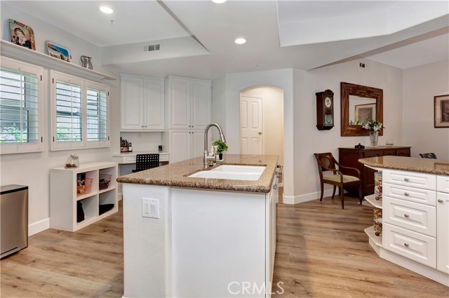 Kitchen and hallway to separate laundry room