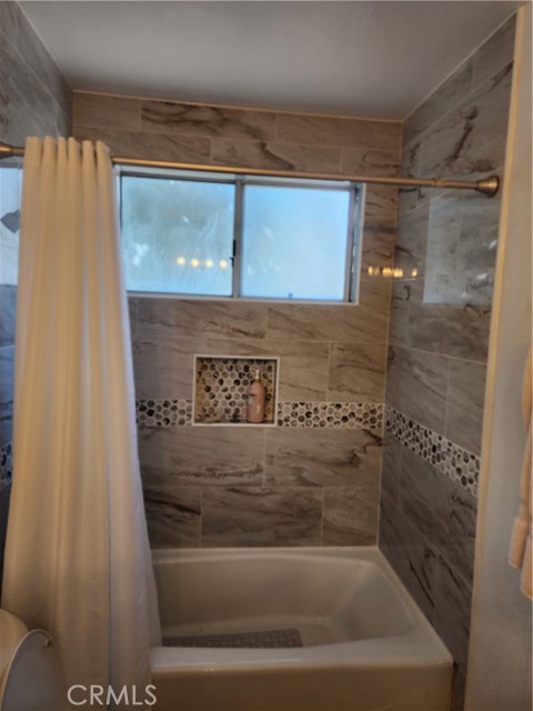 #1 Full Bath at Living Room