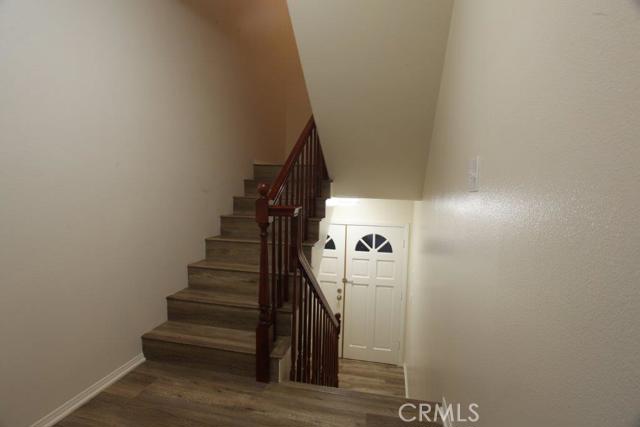 Front door is between lower level and middle level.