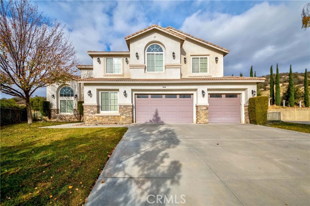 36442 Mesa Edge Drive Yucaipa, California STUNNING WHISPER RANCH EXECUTIVE POOL HOME! Nestled in the Yucaipa foothills, this exquisite home will impress even the most selective of buyers. With over 4400 square feet of living space, the 6 bedroom and 4 bath home offers a large family room with cozy fireplace attached to an elegant chef's kitchen; a master bedroom suite adorned with a sunken tub, two sided fire place, and an over sized walk in closet; 5 large upstairs bedrooms with 3 direct access baths; a downstairs guest bedroom with full sized bath; a downstairs large office or den; formal living room anddining room separated by a two sided fireplace, and 2 upstairs loft areas perfect for homework and play. Looking for some outdoor time? Step into the tranquility of nature with mountain views and a lovely pool and patio. The 3 car garage will accommodate your vehicles and toys. The indoor laundry and utility room adds convenience to the list of amenities. This lovely property is waiting for you to call it HOME!!