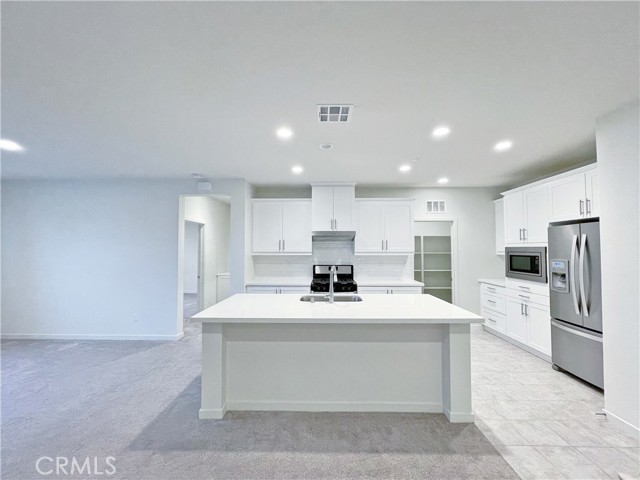 1198 Epic Irvine, California Welcome to this stunning home located at Novel Park in the Great Park Neighborhoods. Indulge yourself in this modern open floor plan home, featuring 3 Bedrooms, 2 Bathrooms, a private covered deck, and 2-car garage. Gourmet kitchen with white shaker cabinets, designer countertops & full backsplash, and Whirlpool stainless steel appliances. Recessed lighting throughout, tile and carpet flooring. Award-winning Irvine Unified School District. Enjoy resort style amenities exclusive to Great Park residents, including swimming pools, spa, lounge areas, outdoor dining areas, parks, walking & biking trails. Nearby shopping, dining, and entertainment!