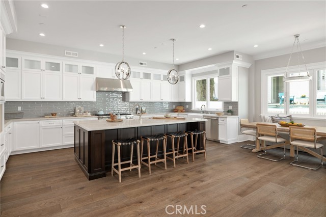 Extraordinary Kitchen with Breakfast Bar Seating and Dining Nook