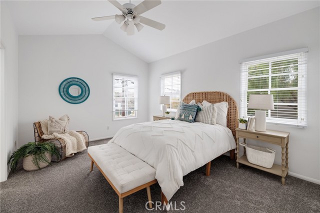 Main bedroom, dual walk in closets Vaulted ceilings