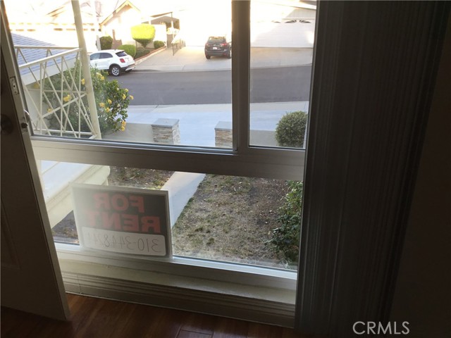   living room w/ picture window lookin down
