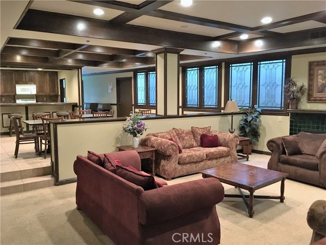 Rec room with full kitchen, fireplace, sitting area and pool table