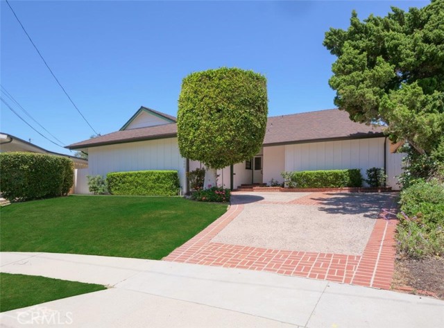 Street view of this very private home at the end of a quiet cul de sac.