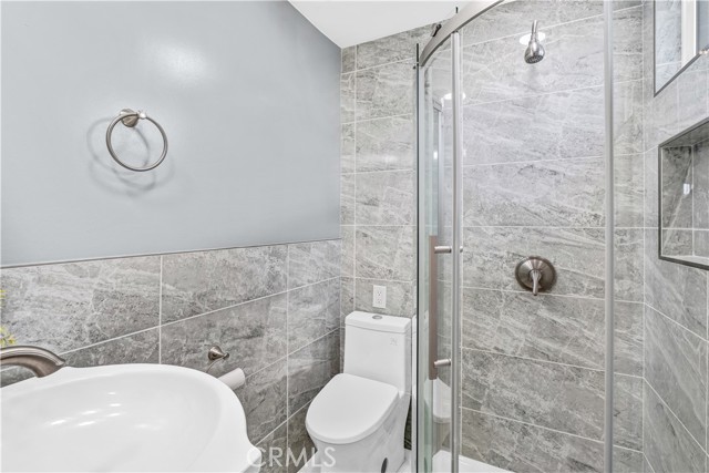 Bathroom with stand up shower.