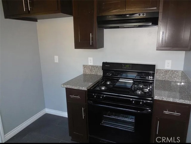 (not pictured)*New floors are lighter. Walls and cabinets are now white. New stove.