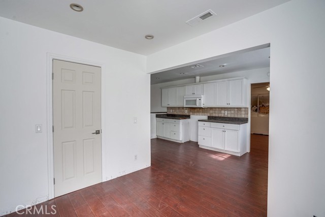 laundry room next to kitchen