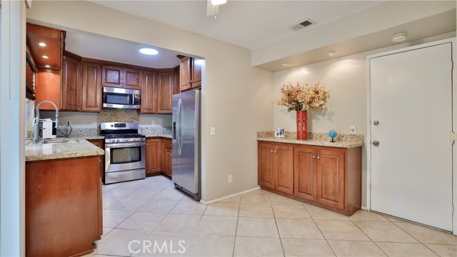 Kitchen & Built in Buffet with Matching Granite Countertop