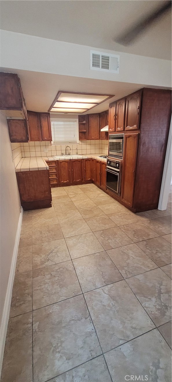 Dining area looking into kitchen.