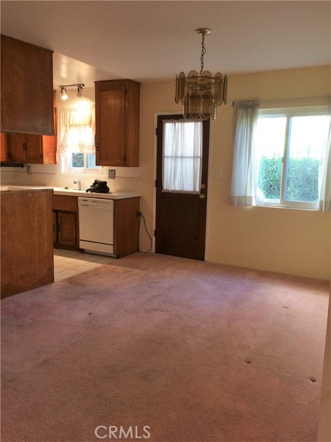 Dining room looking in to kitchen.