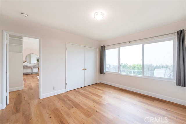 Bedroom with views of city and harbor