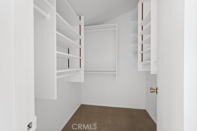 Upstairs bedroom walk-in closet