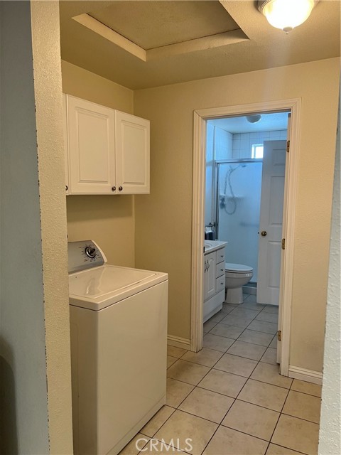 Large laundry room and storage cabinets