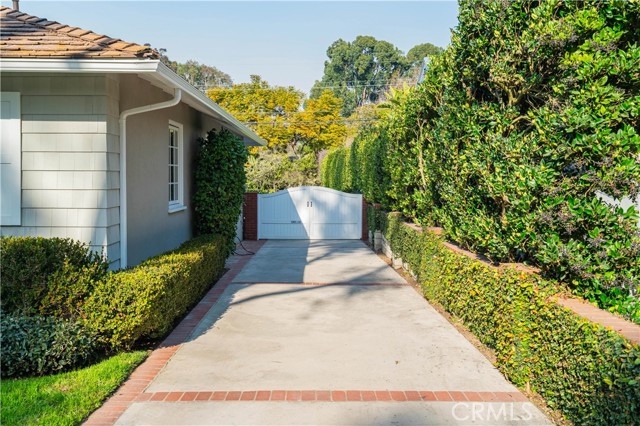 Gate to garage entrance and backyard