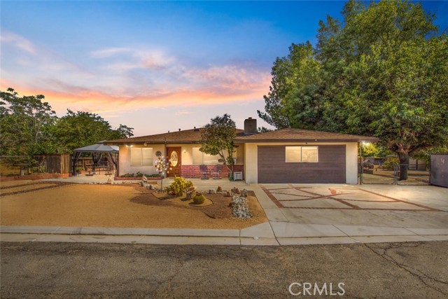 10529 Bellflower Avenue Cherry Valley, California Imagine the possibilities! Close to transportation corridor, warehouse and shopping opportunities. This home features 3 large bedrooms, 2 full bathrooms, a family room, laundry room, plus a bonus enclosed patio room. Located on .4 acre of flat accessible land. Mature trees and a largo gazebo grace the yard with ample shade. Are you looking for a great place to store your boat, RV or other fun toys? The drive in gates make access easy, and would be handy for work vehicles too. This horse property can be cross fenced and configured to your liking, or you may even ask the county if the property could be subdivided. There is an enclosed workshop, an open workshop, an open (hay barn? tool alcove?)storage room, and 3 freestanding sheds to accommodate all of the work and fun accessories. Speaking of fun...the pool is getting filled for your splashing enjoyment! This home in a quiet location has so much to offer. See it for yourself.
