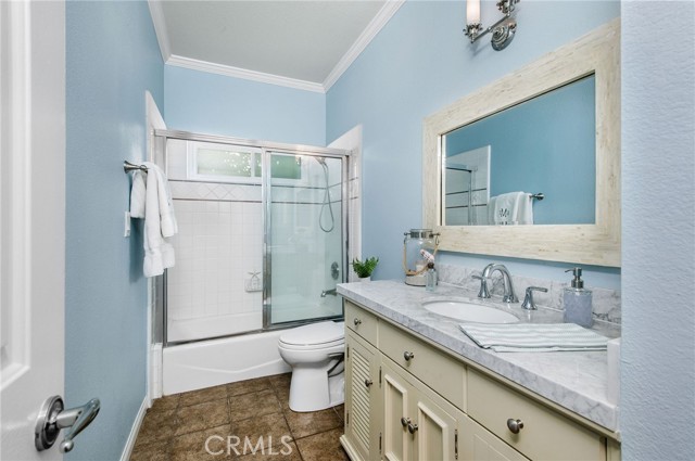 Third bathroom was remodeled in a calming ocean palette.