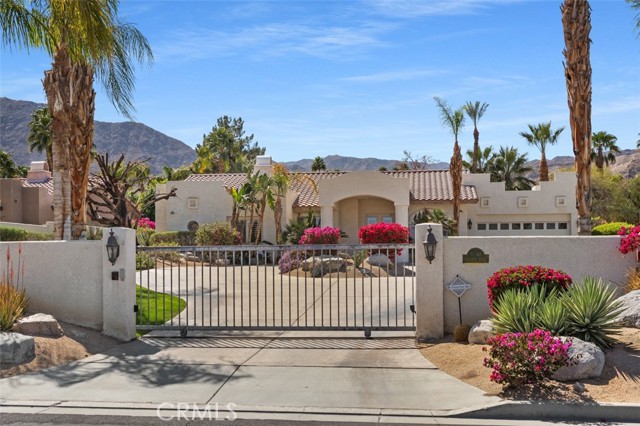 71569 Sahara Road Rancho Mirage, California Welcome to this Beautiful Magnesia Falls, Rancho Mirage estate. The home features five bedrooms, four baths, and all configured as en-suites. The 5th bedroom, just off the pool, features its own split A/C system. This large gated 17000+ sq/ft lot features an Incredible resort-style back yard, large pool, and spa, Unique built-in bar & barbeque area, perfect for entertaining all your family & friends. Smart outdoor seating areas to stay relaxed and safe out of the direct sun. The home has an attached oversized two-car garage with room for seven additional cars on the private driveway. A full laundry room, with extra storage and utility sink, just behind the garage. Some of the home features include dual-paned windows, plantation shutters, an oversized master bedroom with a large walk-in closet, high ceilings, and two fireplaces. The open concept kitchen/family room, with fireplace. A new gas pool heater is six months old, with a new front gate unit replaced just last month. Many Palm trees with fantastic landscaping surround the property. Price includes all furnishing and appliances.