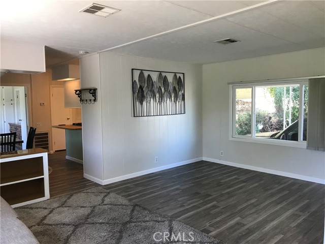 Spacious living room. Easy care new laminate flooring