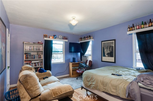 Large bedroom has all kinds of space!  Closet to left and 3 bright windows looking south and west.  I really like this apartment!