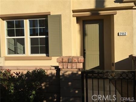 2962 E Via Fiano Ontario, California Newer unit in a gated master planned community, located at an extremely convenient location: Close to 10, 15, 210 freeways; Next to Cucamonga-Guasti Regional Park ; Minutes away from Ontario International Airport , Metrolink stations and California's largest indoor outlet Ontario Mills. Great Rancho Cucamonga school district for elementary and middle school. This home features a bright great room with media niche, granite counters, recessed lighting, stainless steel kitchen appliances, kitchen Island, 3 bedrooms upstairs, tile flooring on the first floor, upgraded carpet and wall paint, gas range. Include fridge, dryer, washer. Amenities at Parkside community include pool, clubhouse, tot lot, park, dog park. Must come to see.