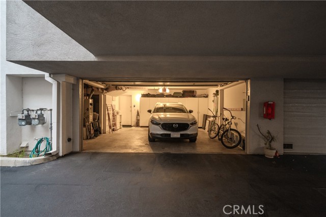 2 car parking garage with built in cabinets