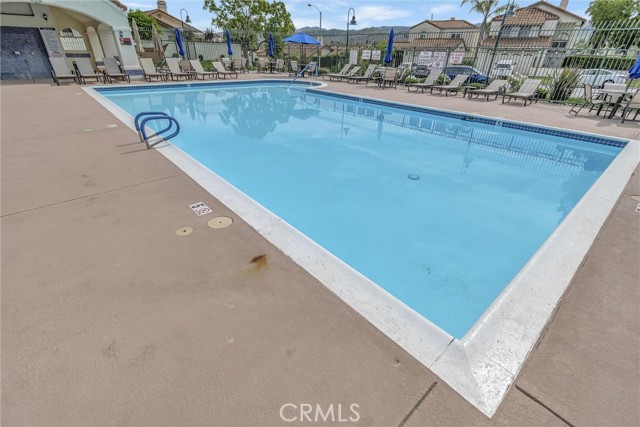 plenty of chairs to lounge around the pool!