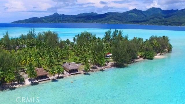 1 Motu Moie French Polynesia, Taha'a Other - See Remarks, Your Tropical Dream - If you’ve ever dreamed of owning your own private tropical island in the South Pacific, covered in lush palms, cooled by gentle breezes, surrounded by warm turquoise waters, teeming with exotic corals and sea life, then your dream could soon come true. Motu Moie, Tahitian meaning “far away isle†is currently for sale. This 20 acre private island motu is located in the Society Islands of French Polynesia, 90 miles from Papeete and 15 miles from the world famous volcanic peaks of Bora Bora. It is situated on the edge of a tropical reef within the lagoon surrounding the island of Tahaa- “the vanilla islandâ€. The property is ideal for a private get-away, or can be developed as an exclusive luxury resort. Discover the beauty of the Polynesian lifestyle. Explore the unspoiled natural surroundings, fish for your own dinner, and relax on your own coral sand beach. Whether you long for peaceful tranquility or active adventure, far from the stresses of everyday life, this paradise could be all yours. Life on a Private Island - The current accommodations include owners bungalow, three guest beach bungalows, dining and relaxing bungalow, caretakers house, sports bungalow, and utility buildings. Fresh water is supplied by the islands natural coral filtered well