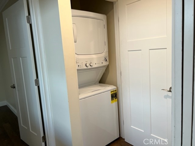 Washer dryer conveniently located in the hall.