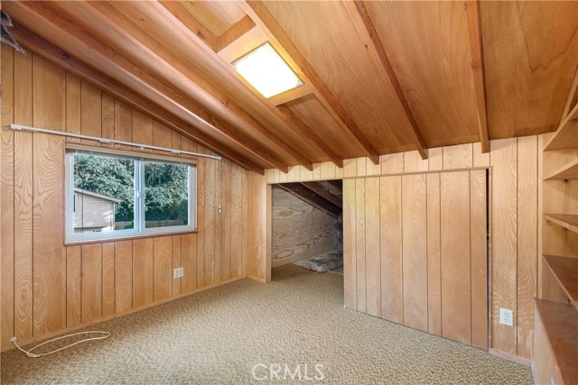 One of two two attic offices with storage