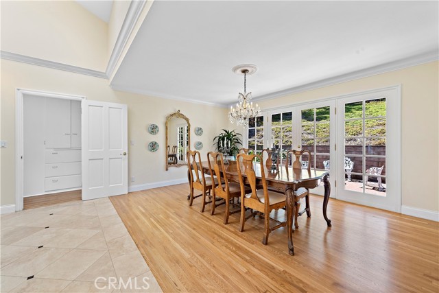 Formal dining room with French doors to private courtyard