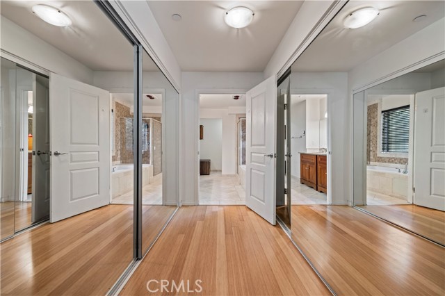 2 Large mirrored closets with wide hallway