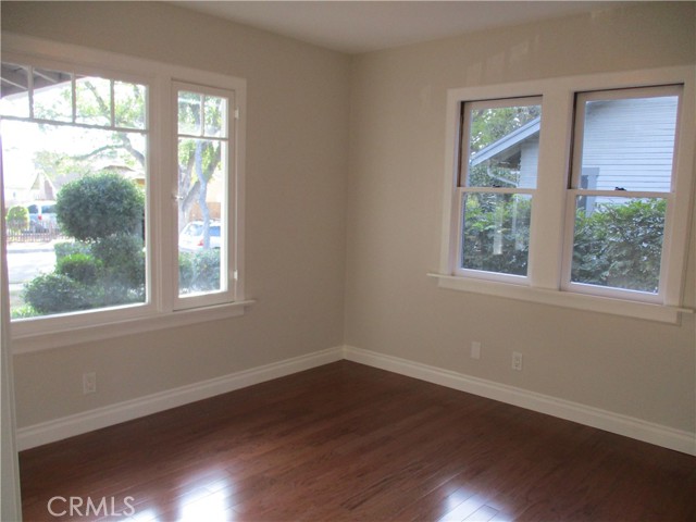 Bedroom 2 is bright and has wonderful views of the manicured lawn.