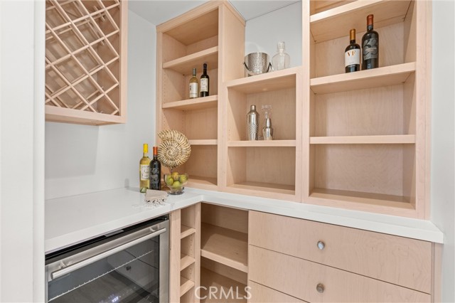 Walk-in pantry with mini refrigerator