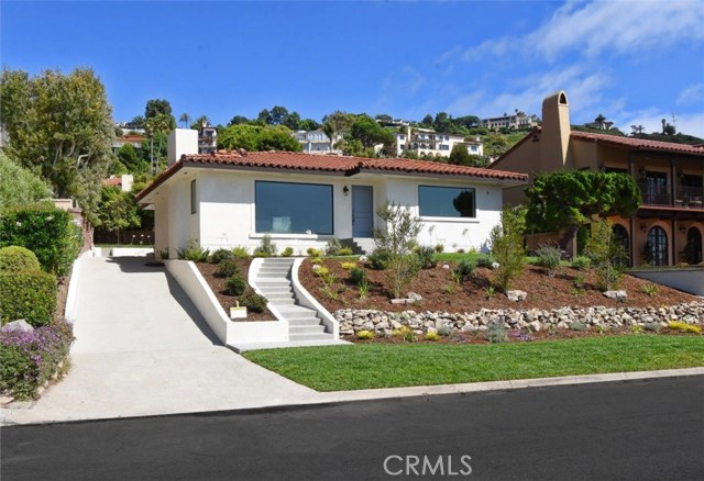 In sough after Malaga Cove neighborhood with panoramic ocean views!