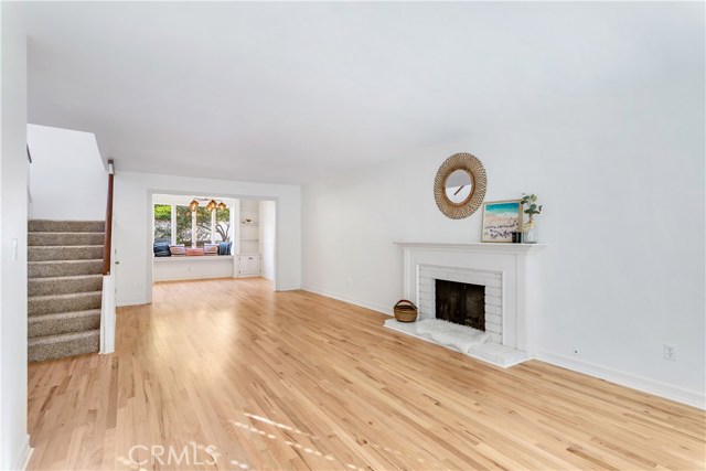 New wood floors in the living room and dining alcove.