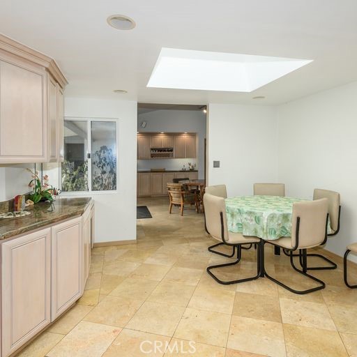 dinning area in kitchen looking towards extra eating area