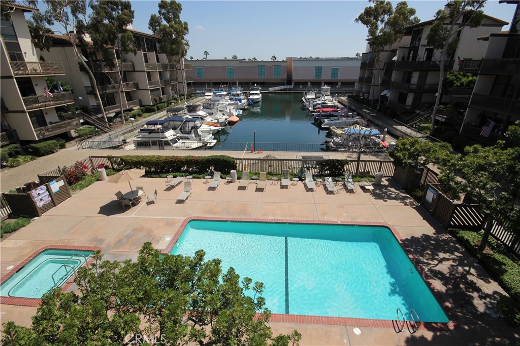 View from Private living room balcony overlooking picturesque marina and pool area!