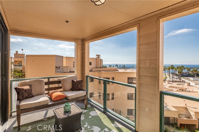 Large ocean view deck to enjoy evening BBQ and beach breezes