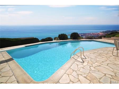 Pool with sweeping coastal, ocean and Catalina views